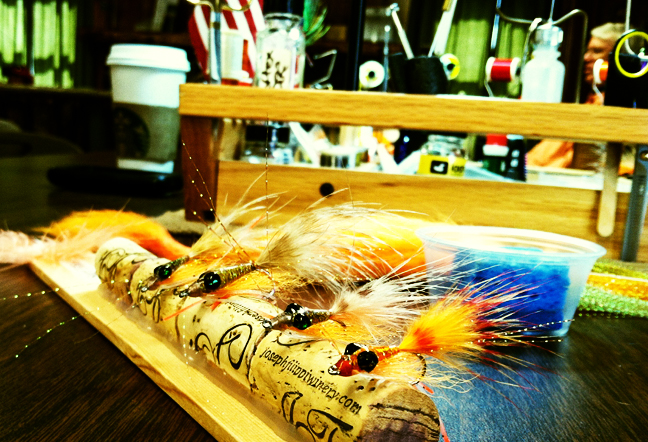 Somes of Dave Valadez's beautifully crafted, epoxy flies. photo by Roy Fukushima