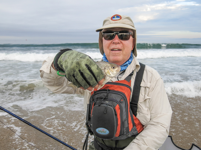 Don Bell with one of his surf perch. photo by Al Q