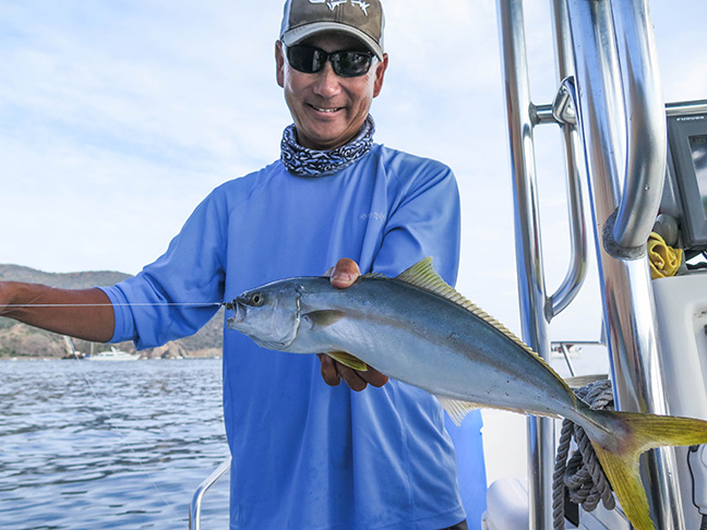 Glenn Ueda with a fine firecracker yellow. photo by Al Q