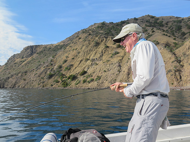 Jim having a ball on one the many bonita caught. photo by Al Q