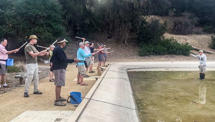 Jim showing the proper hand position for casting. Photo by Al Q